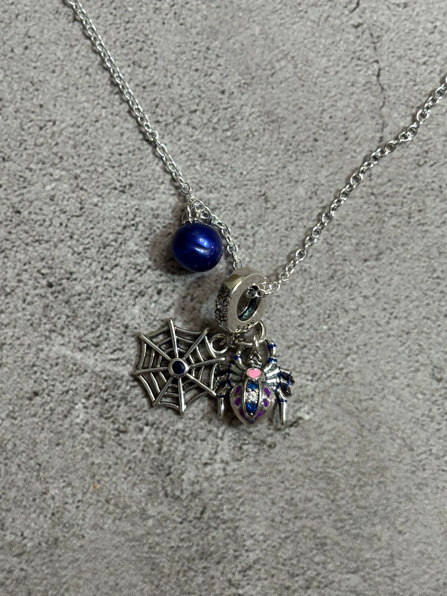 Caught in a Web Charm Pendant